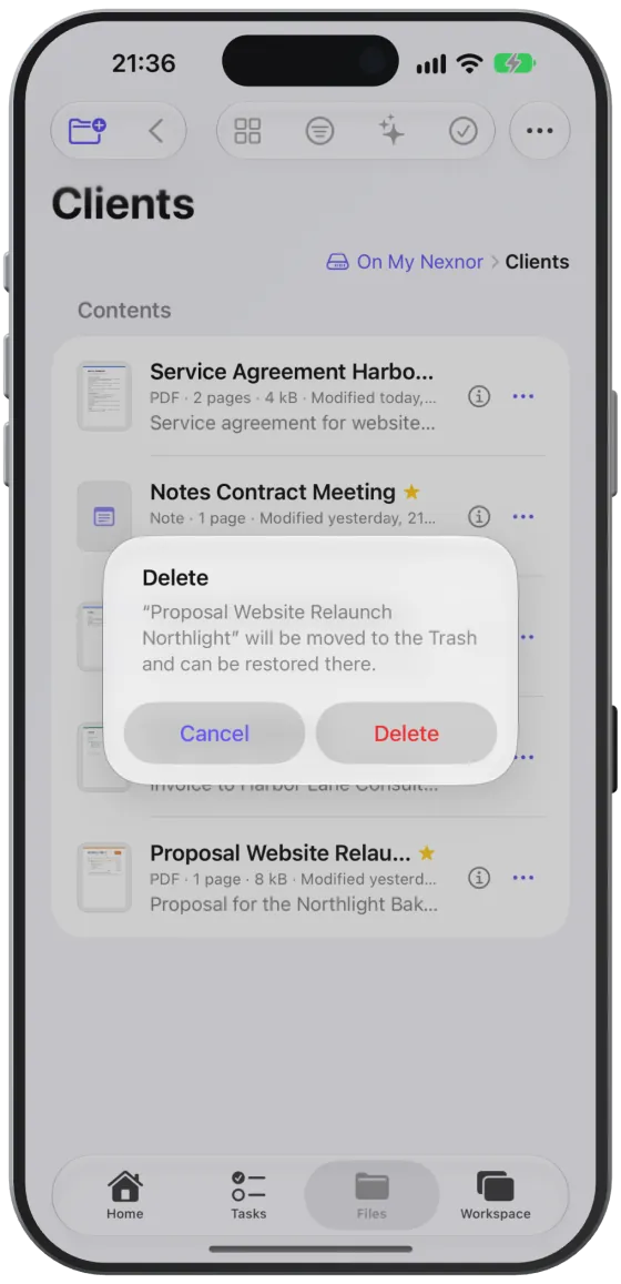 The confirmation before deleting; the files then move to the Trash.